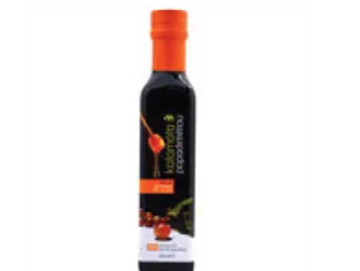 Bottle of balsamic vinegar with orange cap.