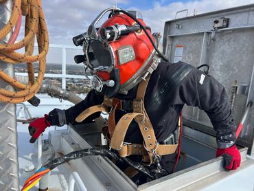 Diver entering water tower.
