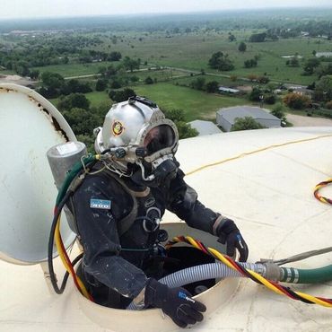 Diver on Water Tower in Central Texas.