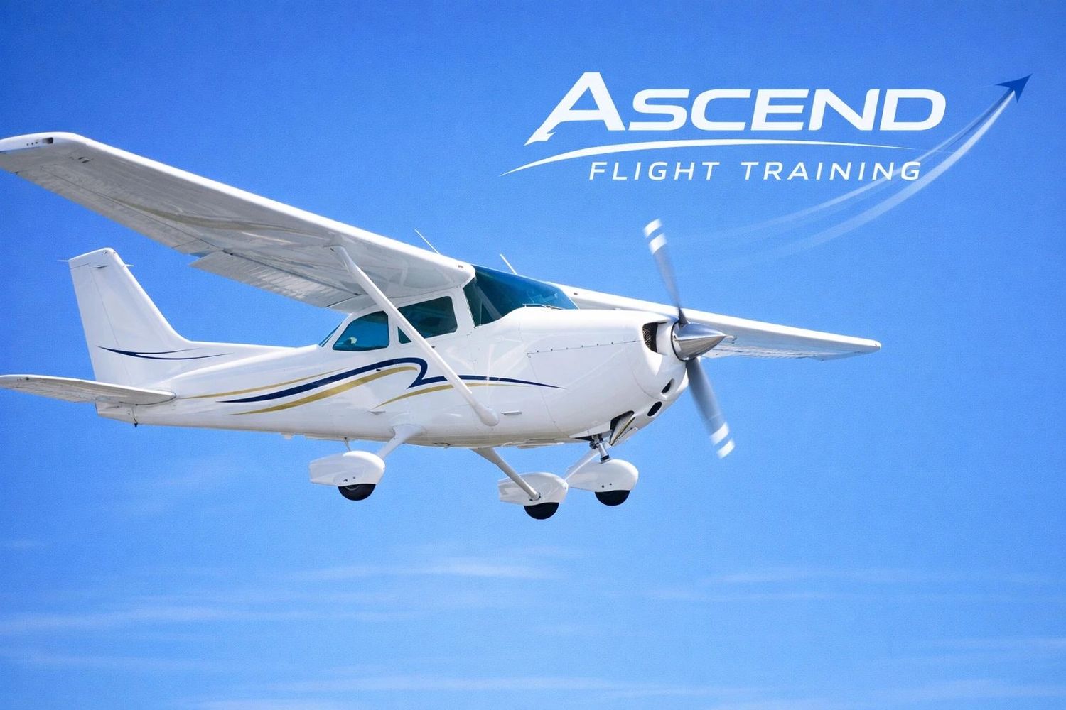 Small white airplane flying against a clear blue sky with Ascend Flight Training logo.