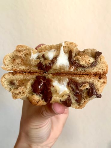 Soft baked smoky milk chocolate chip cookie with graham cracker chunks and gooey marshmallow