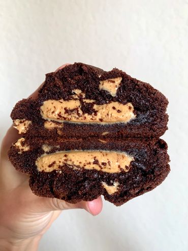 Soft baked milk chocolate and Reese's peanut butter chip cookie, stuffed with peanut butter filling