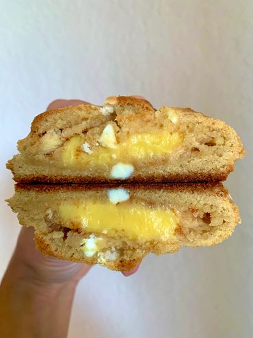 Banana base cookie with Nilla wafer pieces, white chocolate chips, stuffed with banana filling