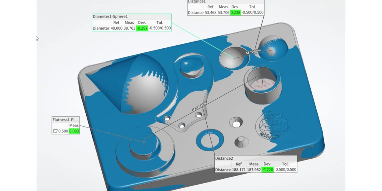 3D scanner and laptop showing scanned object.