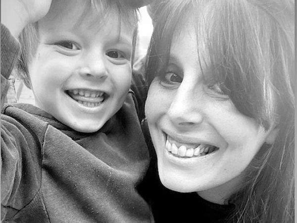 Photo of V.J. Hooker the author and her son