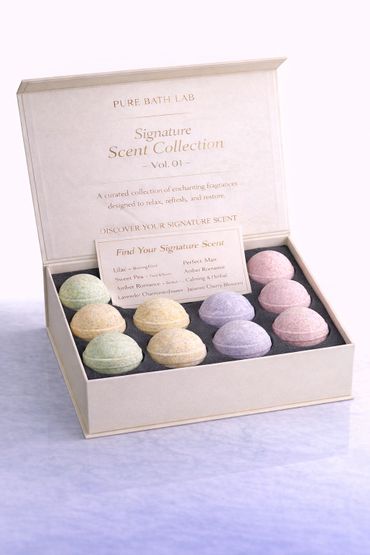 Elegant Pure Bath Lab Signature Scent Collection with colorful bath bombs.