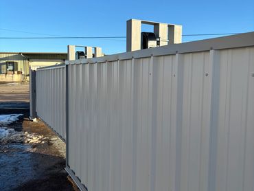 White metal fence installation for Texas Panhandle property.