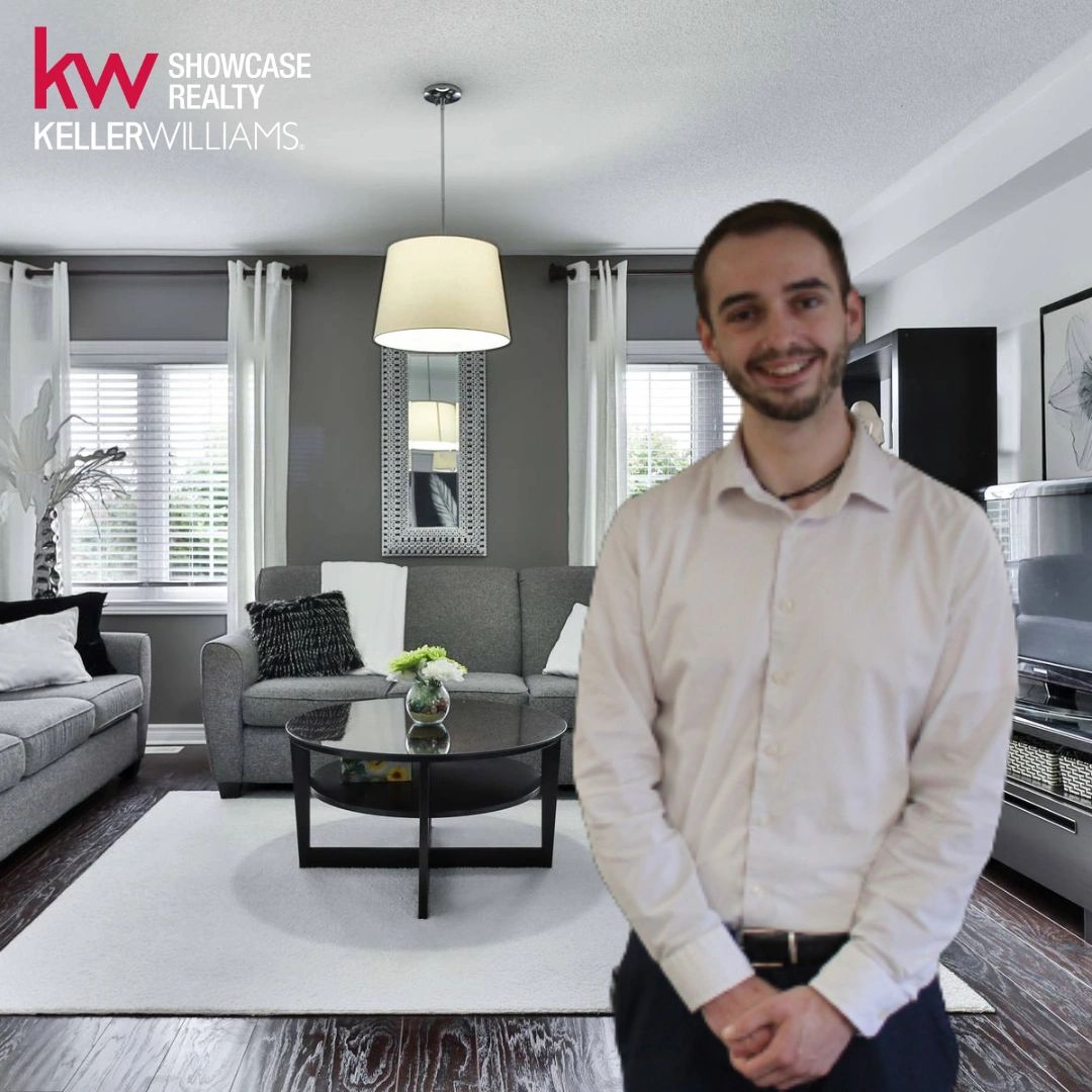 Michael Oberstadt, Real Estate Agent, inside living room with Keller Williams logo