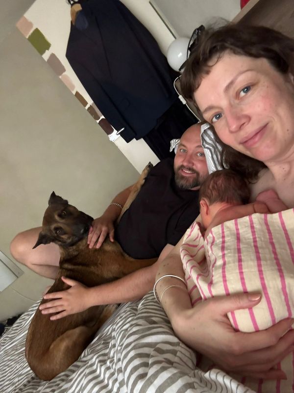 Family in bed after their beautiful homebirth