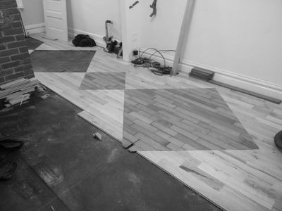 builders-grade-red-oak-with-custom-teak-inlay-hardwood-flooring-installation
