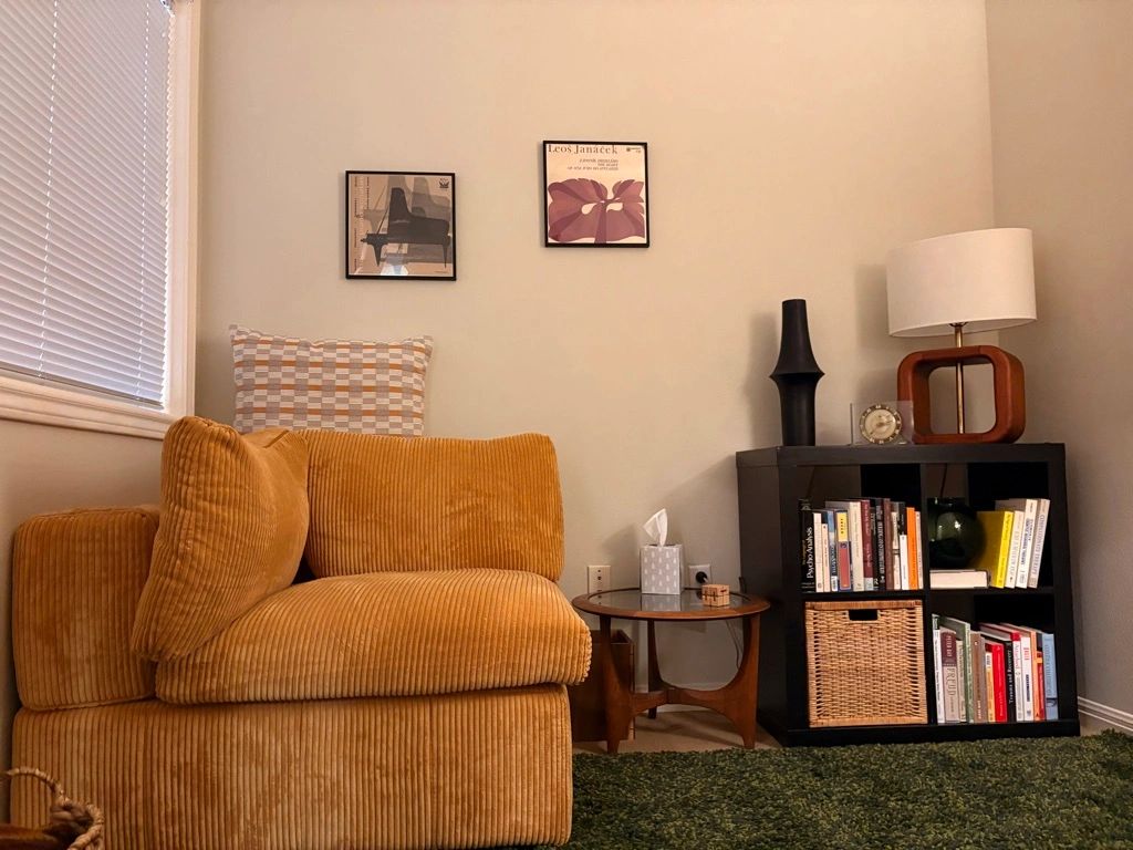 Therapy office in north central Austin with warm lighting and comfortable mid century decor.
