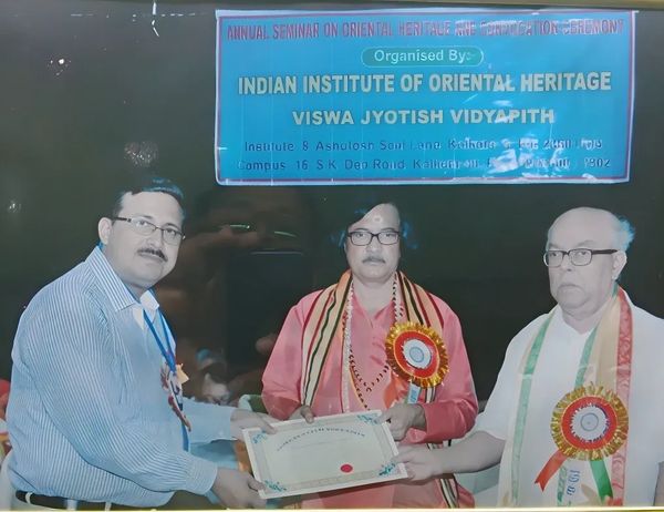 Gold Medal & Certificate awarded to Dr. Subrata Chatterjee for excellence in Vedic & KP astrology.