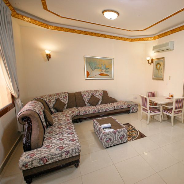 Living and dining area in an Al Bada Resort one bedroom villa