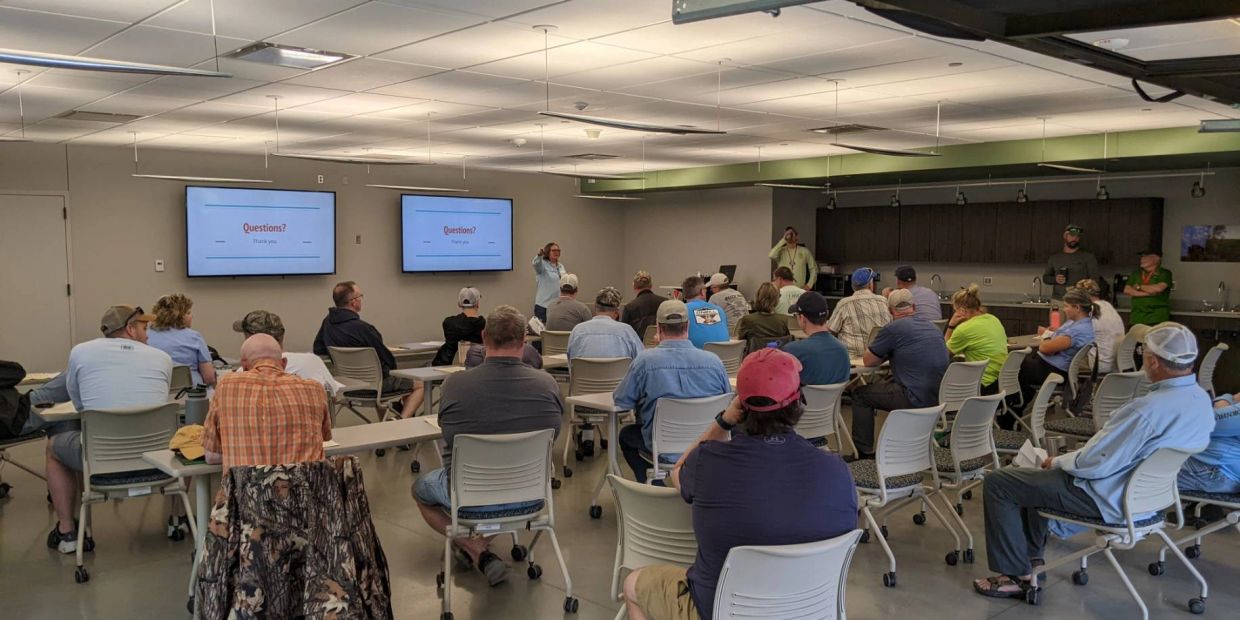 Group attending a presentation in a conference room.