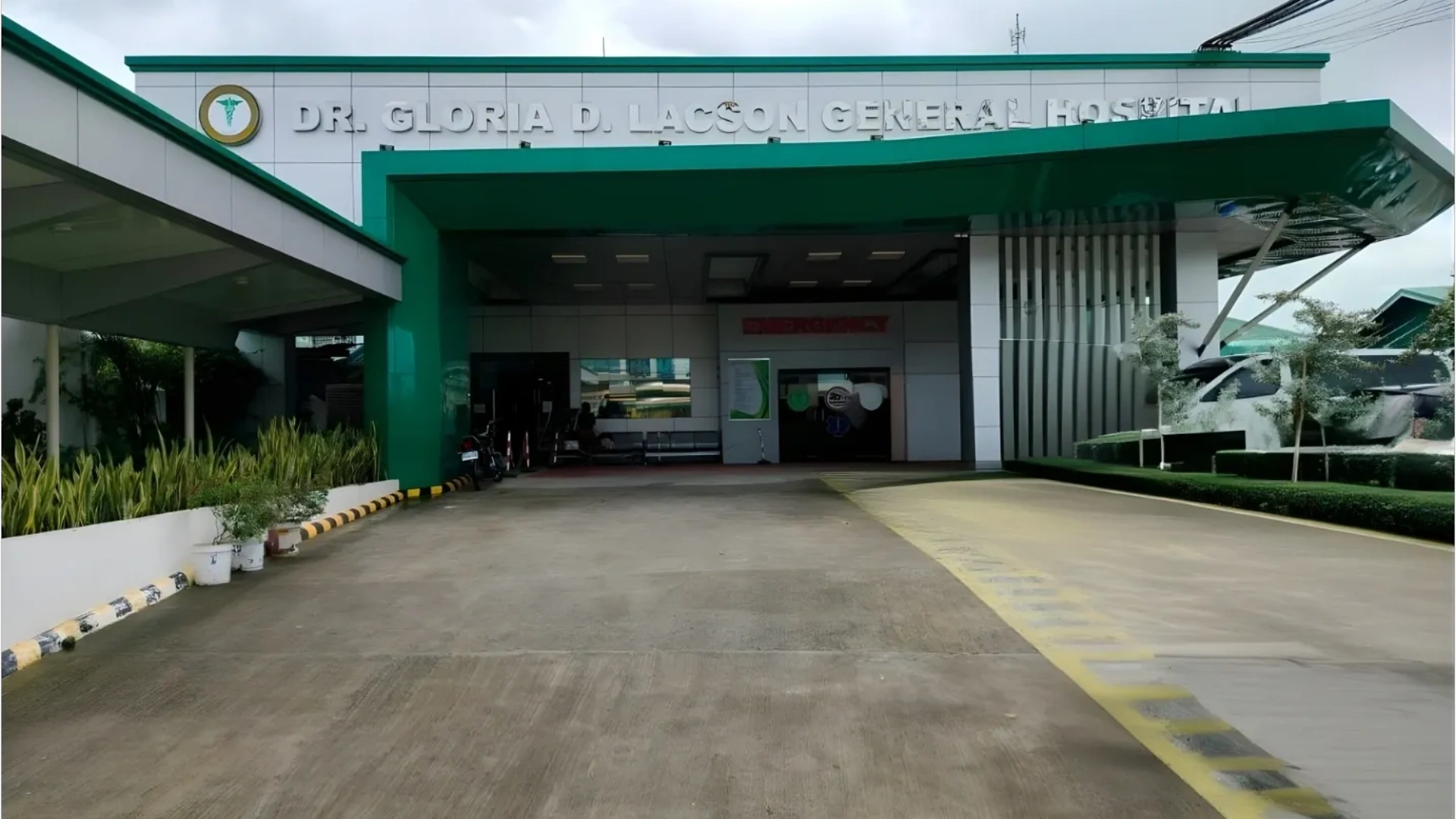 Entrance of Dr. Gloria D. Lacson General Hospital with emergency access.