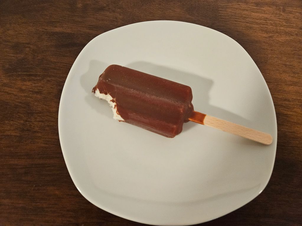 Chocolate covered Vanilla Ice Cream Bar.