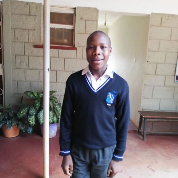 Danson at his high school. His studies are being funded through a Green Olive Educational Bursary.