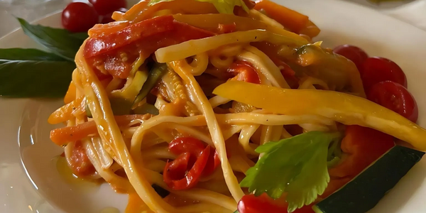 Pasta Primavera!  Fresh 'Spaghetti alla Chitarra' combined with sautéed veggies in white wine.