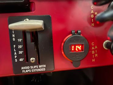 New flap placard plate and twin USB port with voltage indicator. Gold placards for switches.