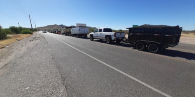 Phoenix landfill line waiting to dump trash for hours. Junk Zombies is willing to do this for you