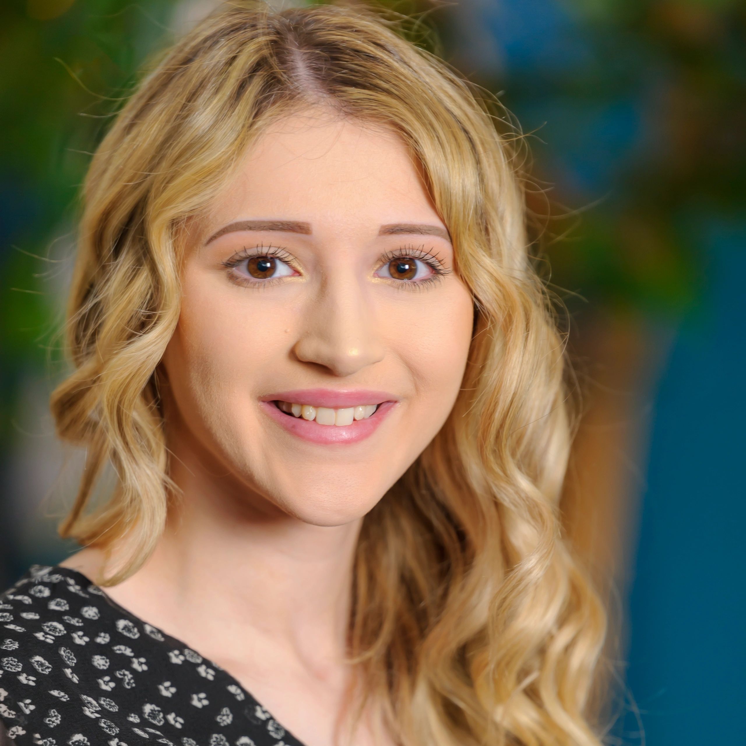 Head shot portrait of girl with blond hair