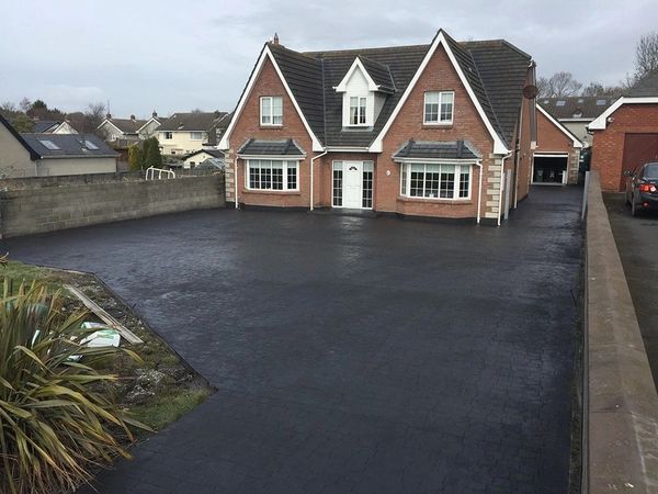 Professional turf laying Exeter. Devon Landscaping's lawn experts. Transform your garden!