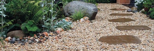 Premium patio installation Exeter. Devon Landscaping's porcelain & sandstone experts.
