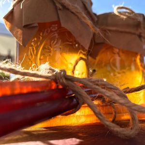 raw honey and some honey sticks