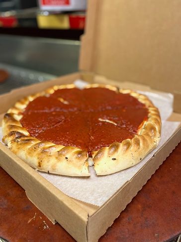 Damgoode Pies Stuffy Pizza in delivery box
