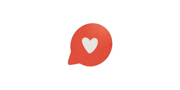 Red chat bubble icon with a white heart in the center on a white background.