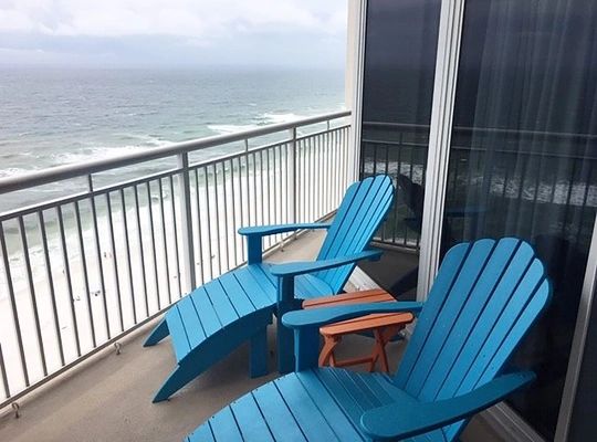 adirondack chairs on a gulf coast balcony