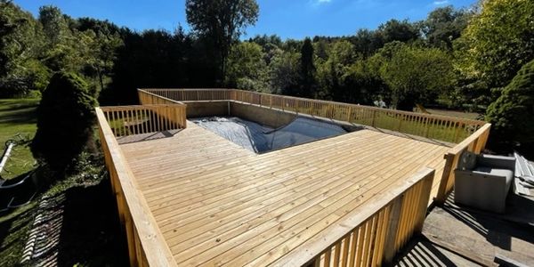 Finished pool deck, railing, and balusters.