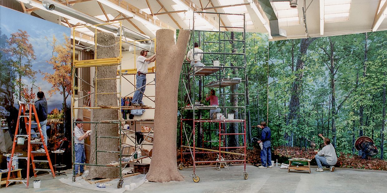 Model makers and mural painters at work.