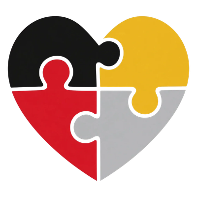 Heart made of four colored puzzle pieces.