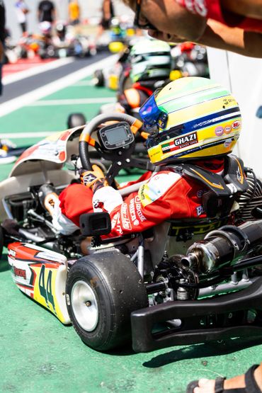 A vibrant sunset over the ocean with colorful clouds reflecting on the water.