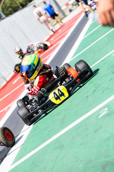 A scenic view of a mountain landscape with a clear blue sky and lush greenery.