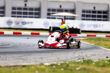 A stunning sunset over a serene lake, with vibrant colors reflecting on the water's surface.