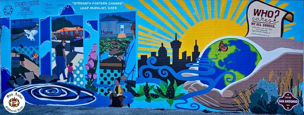 Colorful mural promoting community strength and change in San Antonio.