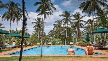 Relax in the pool at the Hilltop Villa in Jim's Farm Villas