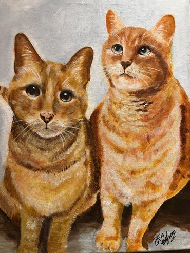 Two orange cats
