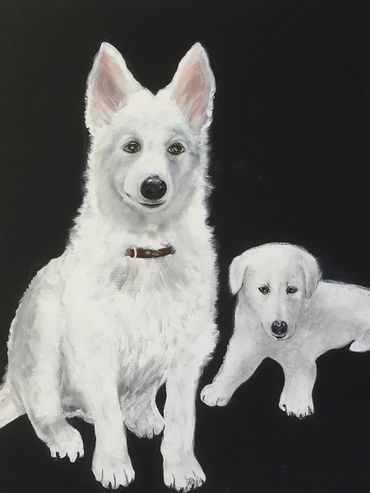 Young white shepherd and puppy