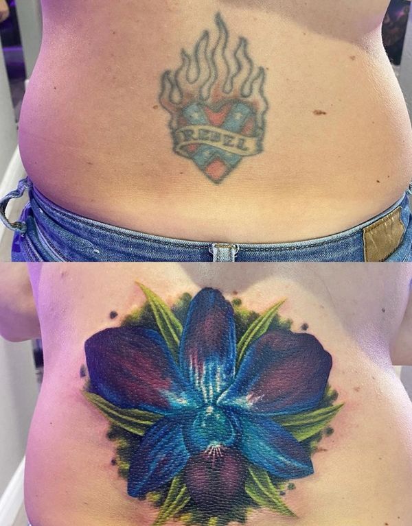 Coverup back tattoo from rebel flag to beautiful flower