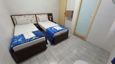 Duas Camas de Solteiro