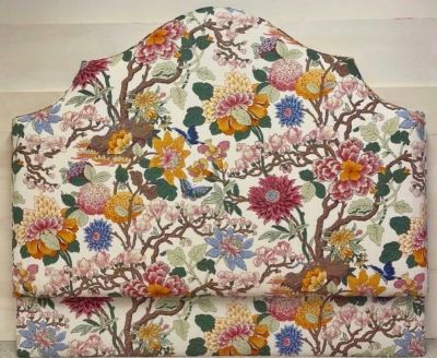Floral patterned fabric with colorful flowers and branches.