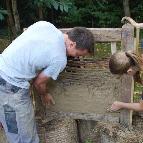 Eleanor Harris demonstrating Wattle and Daub at The Village Church Farm Museum, Skegness