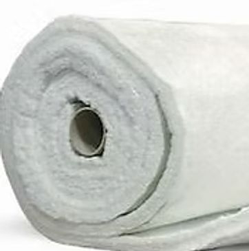 A roll of white fabric or batting material.