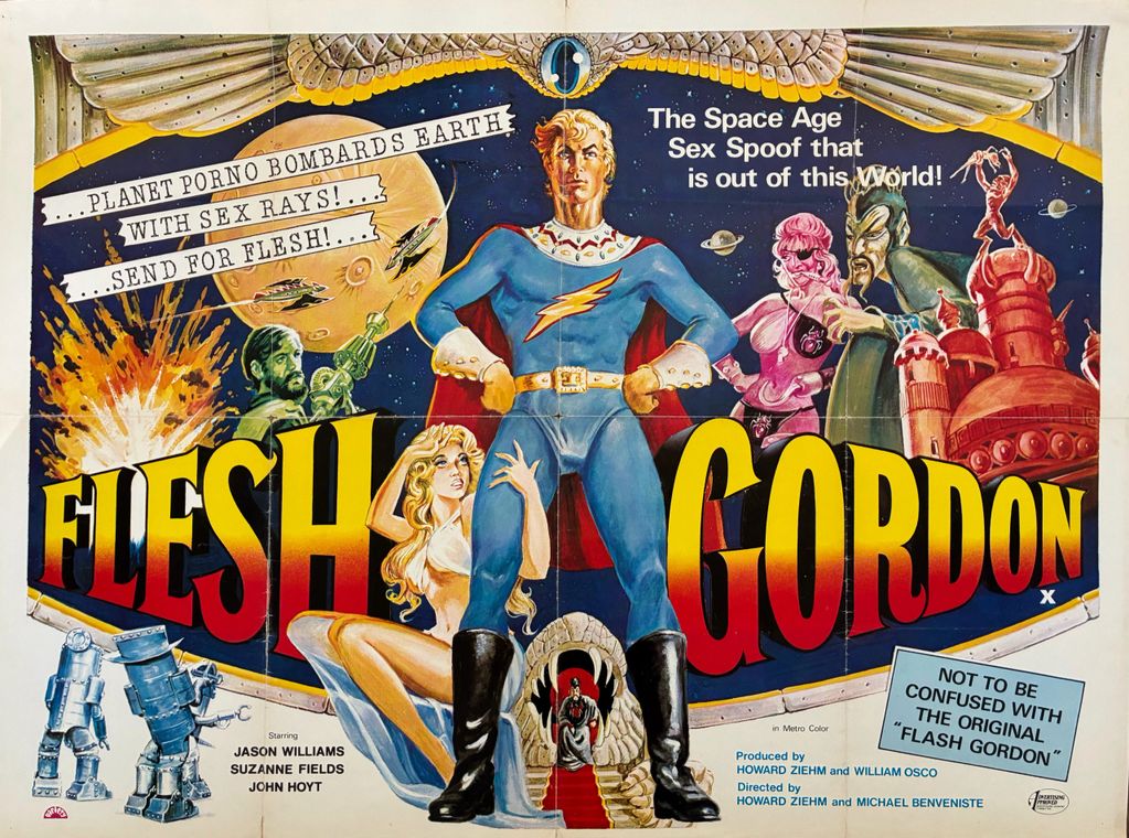 Image of a super hero with a lightening flash across his chest and a lady crouched down, holding his