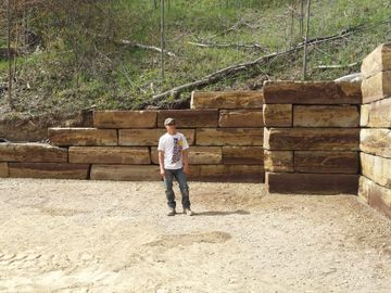 walls wall retaining stone boulder clear stone safety professional landscape helicopter pad tennis a