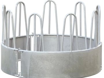Metal livestock feeder with multiple bars.