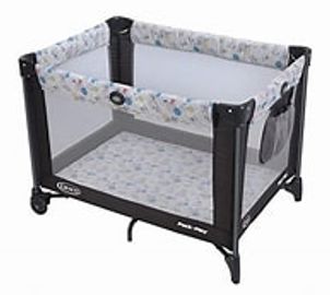 Portable baby playpen with mesh sides and wheels for easy mobility.